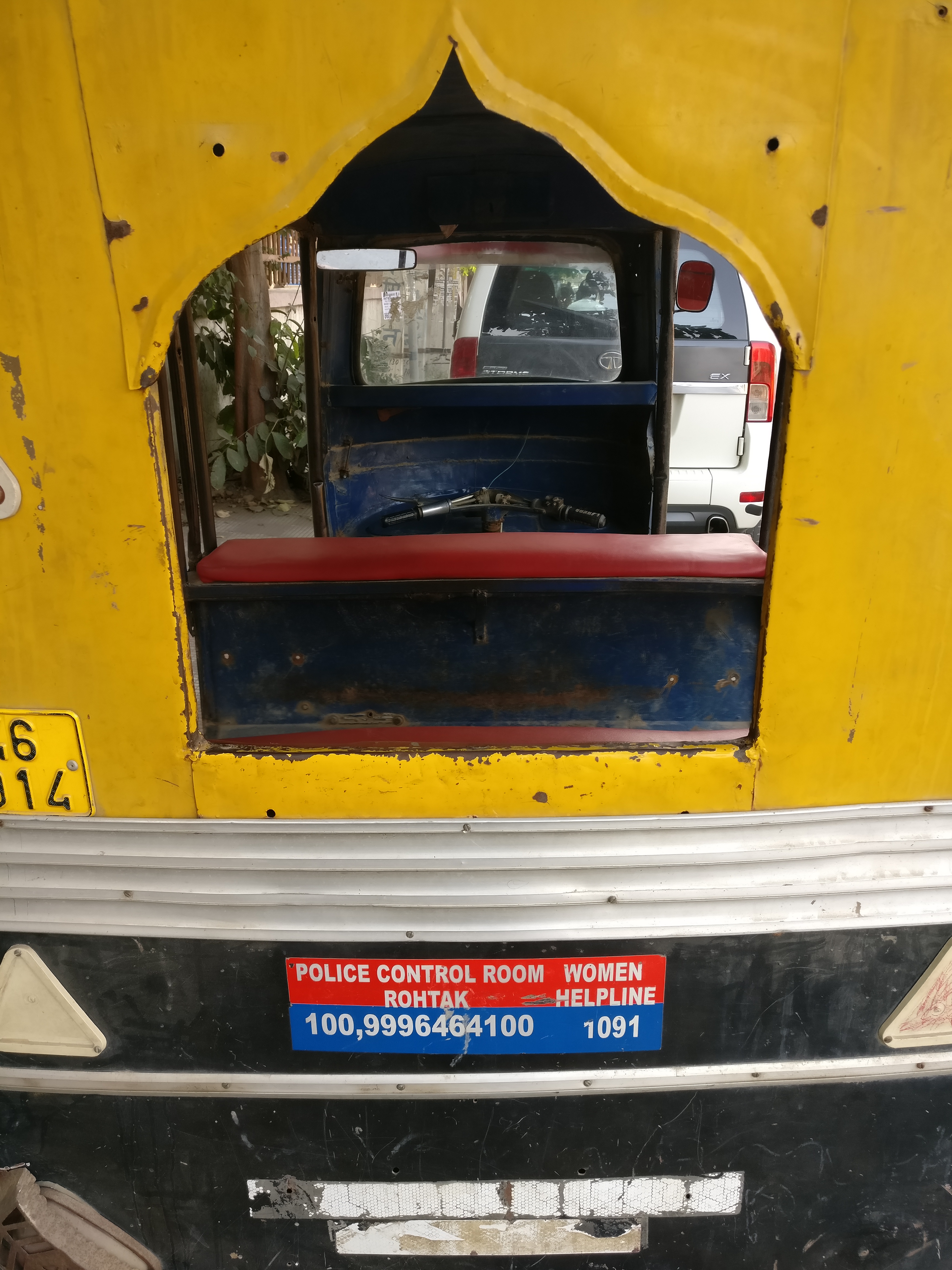 1090 helpline display on autorickshaw